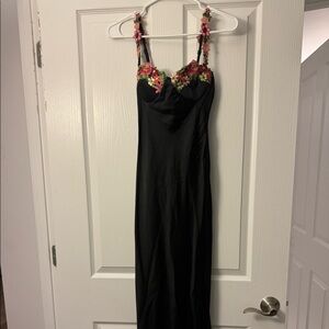 Black maxi dress with flower detailing